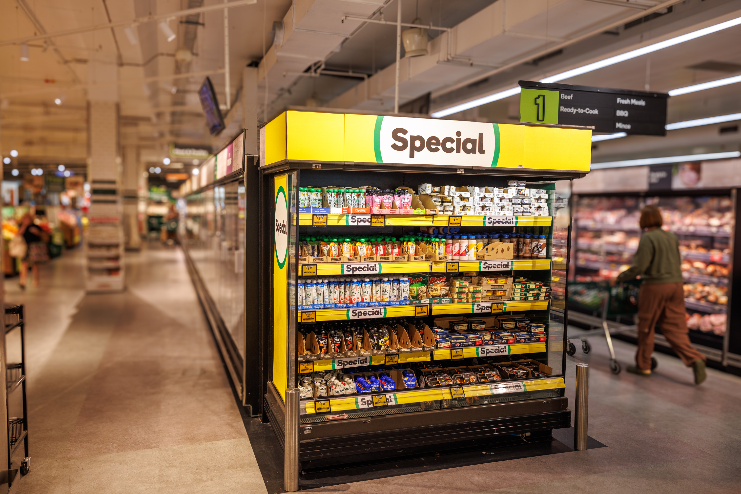 aisle end fridge with yoghurt promotion