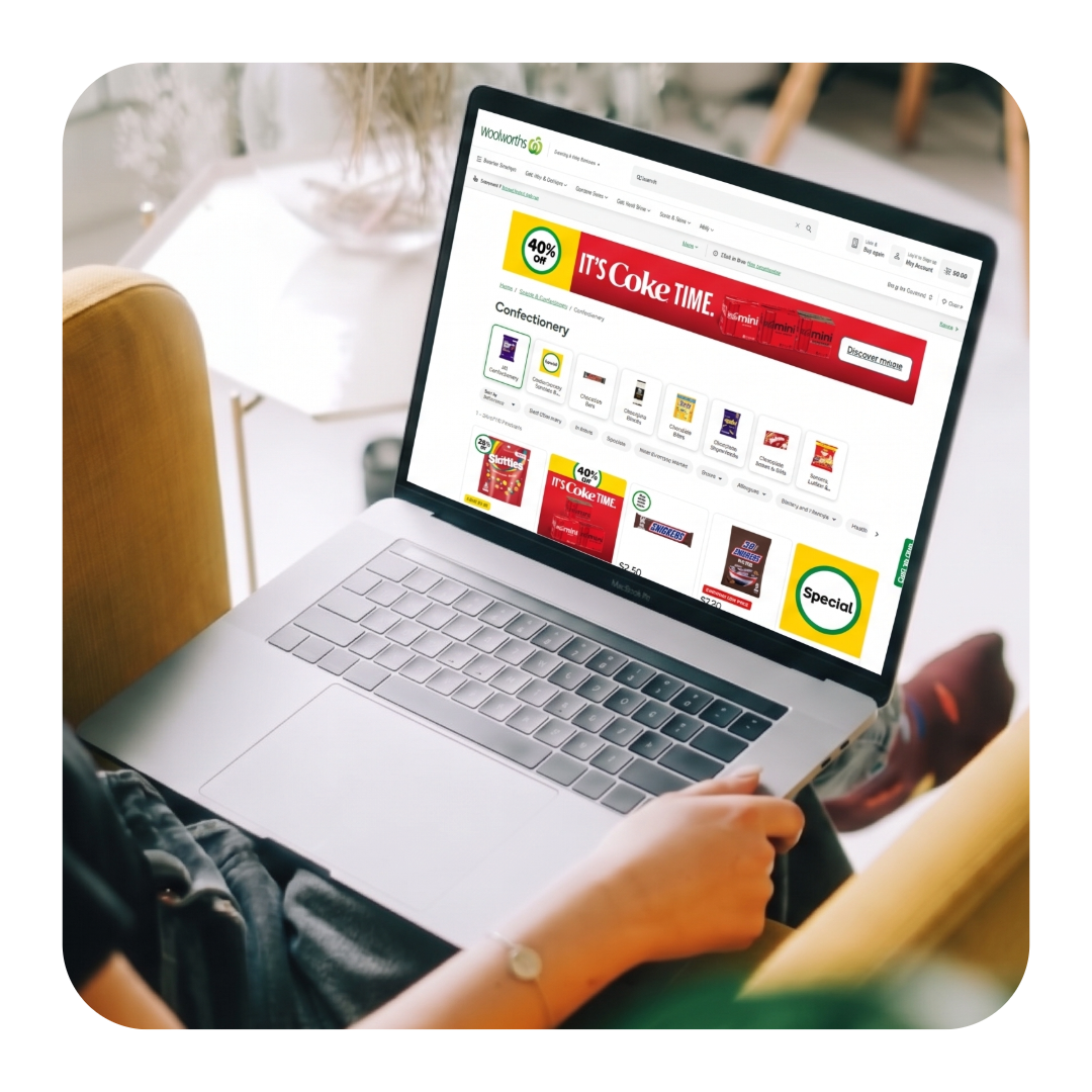 coke ad on laptop
